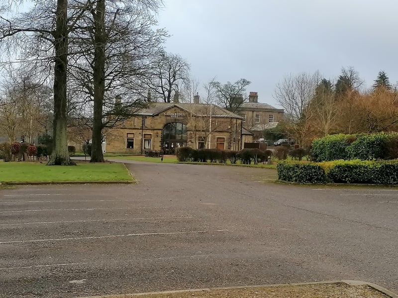 This beautiful old mansion house offers a picturesque backdrop for wedding photography, complete with a grand conservatory and an outdoor terrace overlooking the grounds. It was singled out by reader Alexandra Hall, who explicitly highlighted the venue as "beautiful."