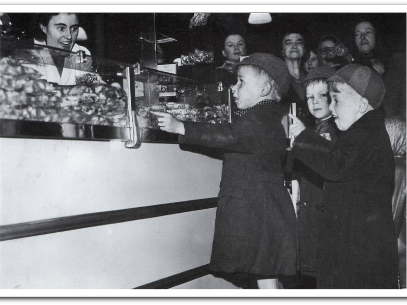 The famous sweat counter in Woolworths; Fishergate store in Preston during 1949.
April 25, 1949 was the 'official' end of sweet rationing, however they remained in relatively short supply for a number of years afterwards. Sweet rationing was implemented in 1942.