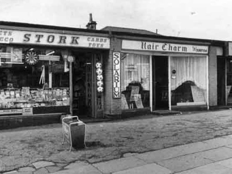 Businesses on Mansfield Road, Intake, in 1985, showing Stork newsagents; Hair Charm, hairdressers and solarium; and Bendix Launderette