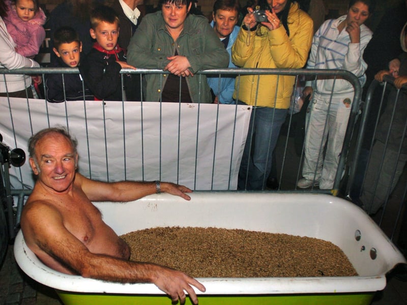 Councillor Peter Price sits in a bath full of maggots in aid of Macmillan Cancer Support outside Sheffield Town Hall during Fright Night in October 2006