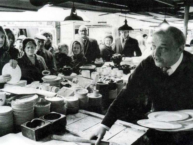 'Potty' Edwards entertaining the crowds at his stall in Sheffield's old Sheaf Market in 1973