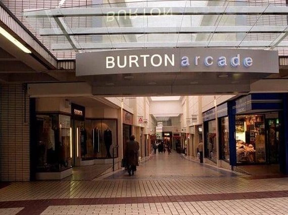 The 1970s Burton Arcade, seen from the Trinity Street Arcade, looking east towards Briggate, Leeds. By 2008, it had been demolished to make way for Trinity Leeds, the new retail and leisure centre, which opened in 2013.