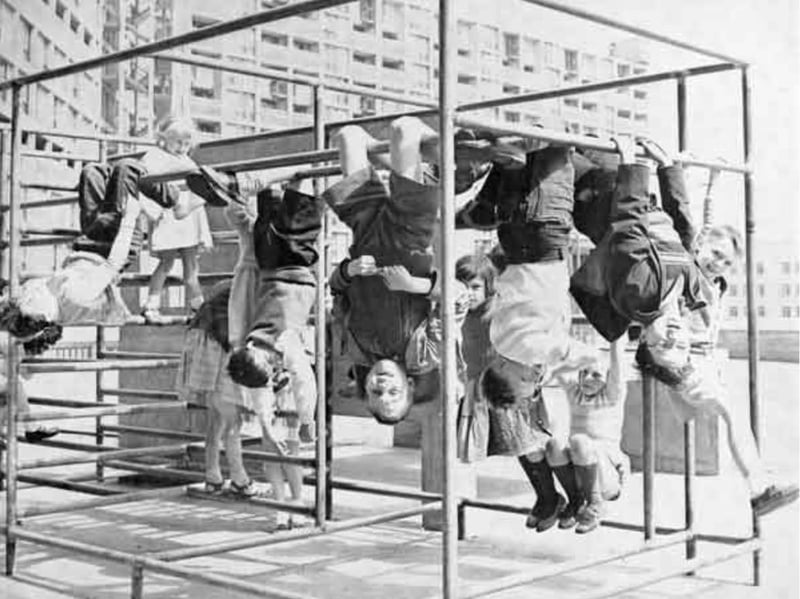 Children hang out in the playground at Sheffield's Park Hill flats in 1961