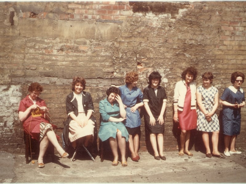 Workers from the binding department taking in a little sun on their lunch break at Mather Brothers on Garstang Road, Preston. The photo was taken in the early 1960s and was sent in by Fulwood reader Linda Hyde who is second from the left.