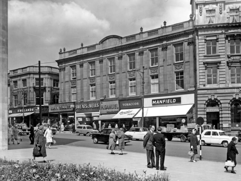 High Street, Sheffield city centre, in 1965, showing John Collier tailors, Swears and Wells furriers, H. Samuel jewellers, Bewlay (Tobacconists), and Manfield and Sons shoe shop