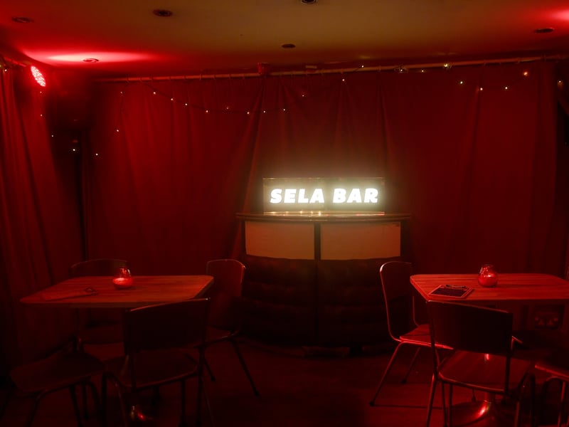 An underground basement party serving stone-baked pizzas, craft beers, and Halloween cocktails alongside vinyl DJs spinning retro funk, soul, and rhythm & blues into the early hours. 🎃 Sela Bar, New York Street