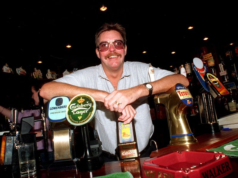 Paul Clarke behind the bar at The Cossack pub, Howard Street, Sheffield, in 1997