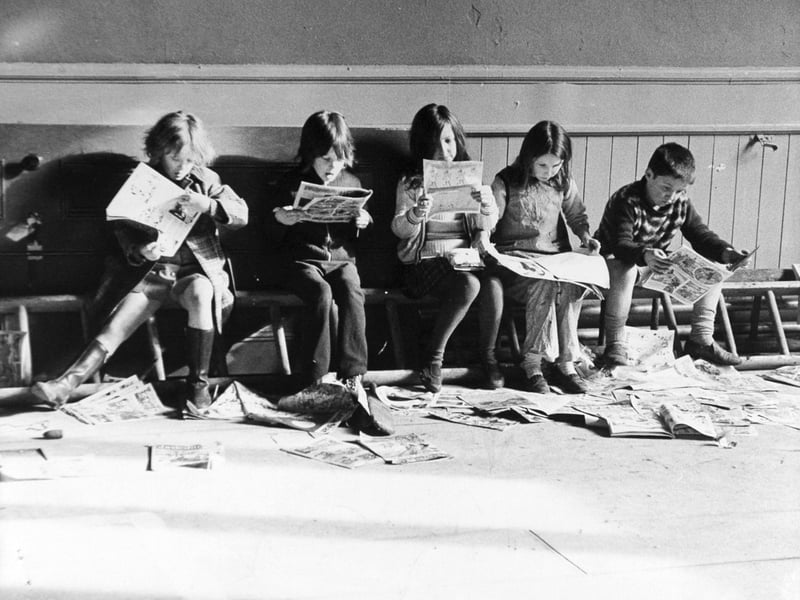 Pupils reading comics at Leeds Free School in February 1973