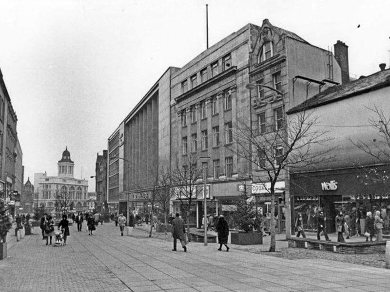 Shops on Fargate, Sheffield, in November 1974, including Wallis, ladies outfitters; Thomas Cook, travel agents; and Woodhouse Furnishers