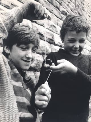 Conkers has been banned at some schools for health and safety reasons. This picure shows Kevin Hutchinson and Mark Dawes of Crookesmoor Junior School playing the game in September 1974. Photo: Sheffield Newspapers, National World