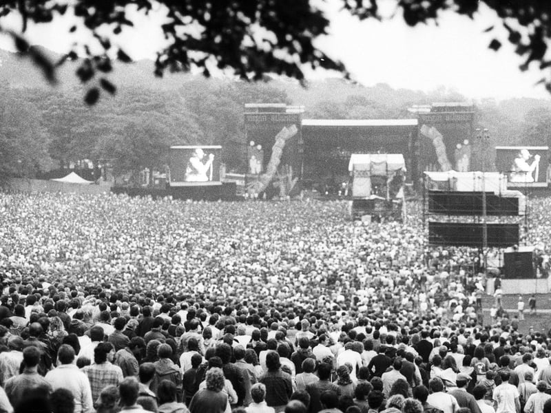 A huge crowd turns out to watch Genesis play at Leeds' Roundhay Park in July 1987