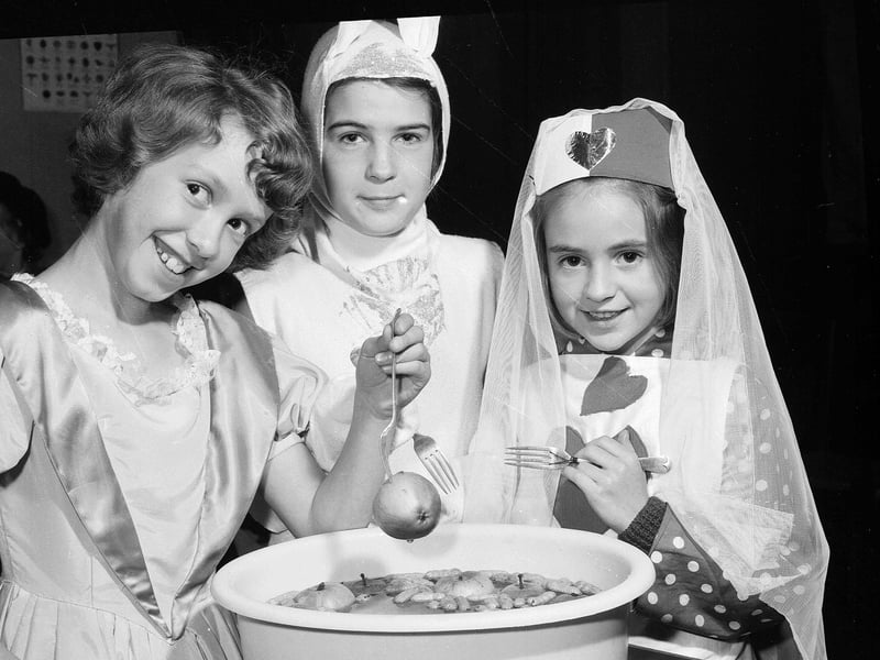 Brownies dooking for apples in 1964.