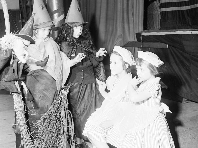 A couple of witches casting a spell at the Old St Pauls Brownies Halloween party in Church Hall, Jeffrey Street, Edinburgh, in 1961.