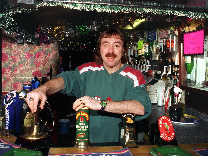 Graham Pugh behind the bar at his pub in Hillsborough, Sheffield, in 1997