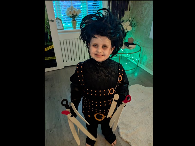 Amy Louise writes "my little boy as Edward Scissorhands." How is he going to open sweet wrappers in those things?