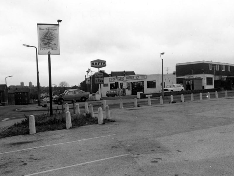 Hollinsend Motor Company, on Hollinsend Road, Intake, Sheffield, at the junction with Alnwick Road, in November 1978, with the sign for the Hollin Bush pub in the foreground