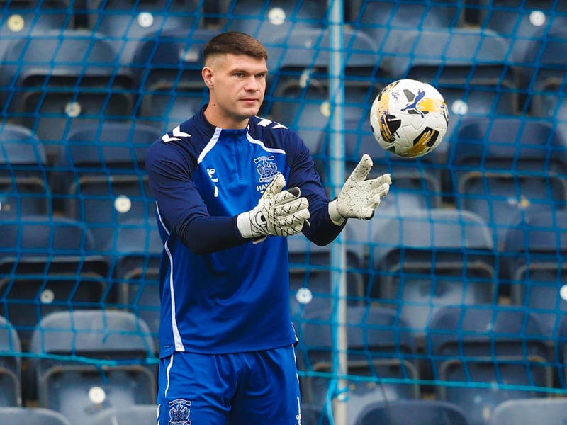 The goalkeeper was forced off with a knee issue in the club's last game against Hearts and is out for a "considerable amount" of time.