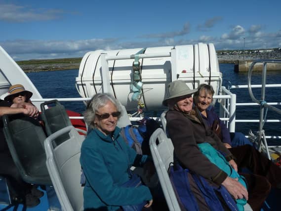 Calm before the storm… Ann, Tim and Trilly Keatinge on the ferry leaving Doolin for an eventual trip to the Aran Islands.
