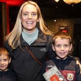 Grainne Uí Fhlatharta, Indreabhán with Cian and Tom Fhlatharta, at the opening on Friday night of Fionn Agus Clochán An Aifir, the Christmas Pantomime by Fíbín in An Taibhdhearc. Photo: Mike Shaughnessy.