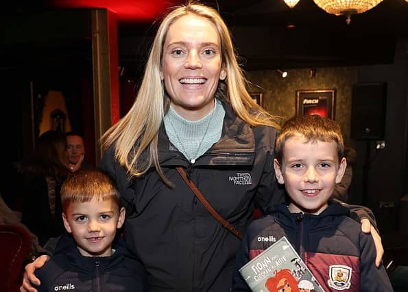 Grainne Uí Fhlatharta, Indreabhán with Cian and Tom Fhlatharta, at the opening on Friday night of Fionn Agus Clochán An Aifir, the Christmas Pantomime by Fíbín in An Taibhdhearc. Photo: Mike Shaughnessy.