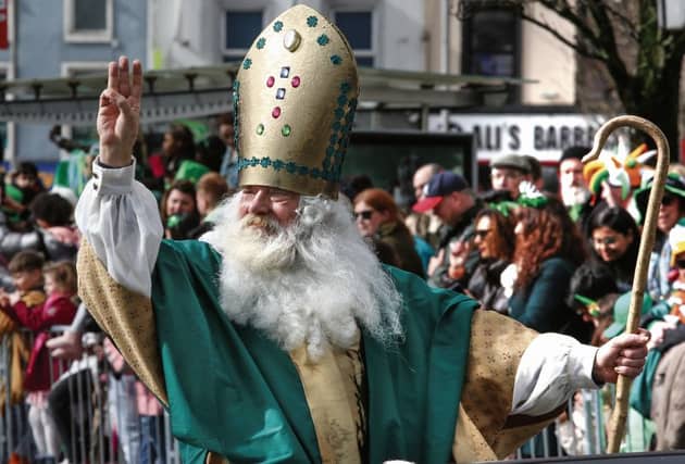 St Patrick himself waves to the crowd as passes through Eyre Square during last year's parade. Photo: Joe O'Shaughnessy.