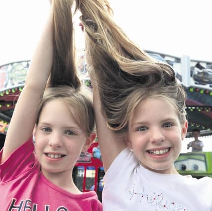 Nine year old twin sisters Sarah and Amy McMahon from Castlegar, Galway, who are to have their hair cut to help kids who need wigs.