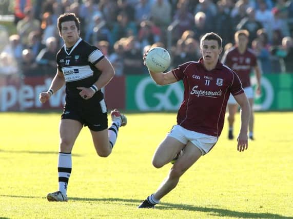 Galway attacker Shane Walsh breaks away from Sligo's Brendan Egan during the Connacht championship quarter-final.