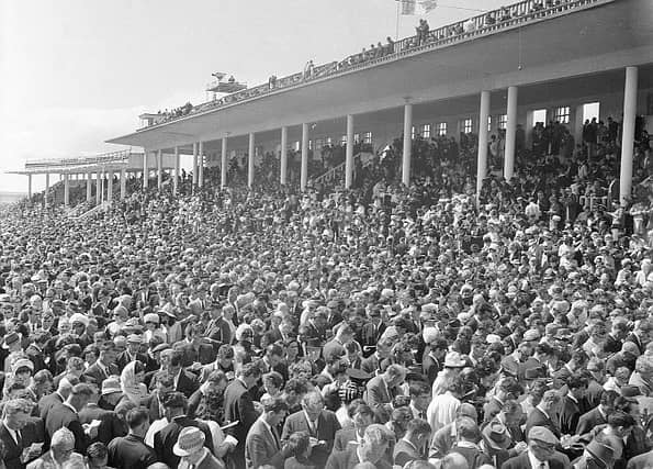 The thronged old stand at Ballybrit during the Galway Races in 1973, when the summer festival was a four-day event, running from Monday to Thursday.