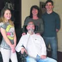 Motor Neurone Disease sufferer Andrew Lydon with his wife Sally, daughter Molly (12) and son Seosamh (17)