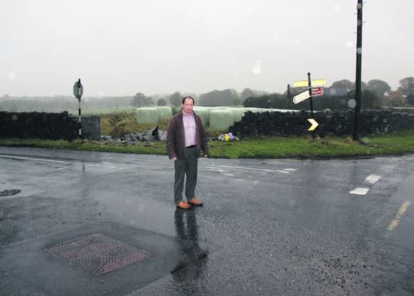 Cllr Aidan Donohue stands at Nutfield Cross, also known as Ashes Cross, on the main Ballinasloe to Kilconell Road (Photo: Gerry Stronge)
