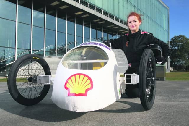 Galway student Mary Rose McLoone unveils ‘the Geec’ (Galway energy-efficient car) at NUI Galway. PHOTO: AENGUS MCMAHON