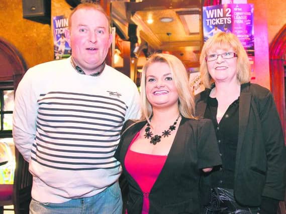 Great news...Katie O'Halloran with her parents Tom and Catherine.