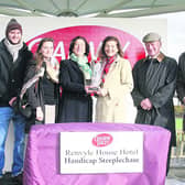 Zoe Fitzgerald presents the winning trophy to Ronagh O'Brien after Valours Minion won the Renvyle House Hotel Handicap Steeplechase at the October meeting at the Galway Races. Also in photo are, Val O'Brien, trainer, Gary O'Brien, Barbara O'Brien, Seán O'Brien and Niall O'Brien.