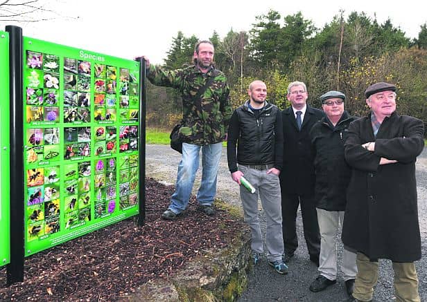 Friends of Merlin Woods at the launch of a map and information board. From left: Colm Stanley, photographer and designer, John Lusby, Birdwatch Ireland, Cllr Frank Fahy, Noel Barbour, photographer, and Kevin Hough, map design. Photo: Joe O'Shaughnessy.