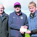 Liam Challoner of Challoner Trophies, Mountbellew, the new Galway Under 21 hurling championship sponsors, with Hurling Committee Chairman Michael Larkin and Secretary Pat Kearney.