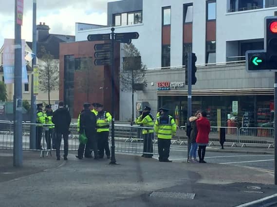 Gardai on duty at the junction of University Road and Newcastle Road this morning