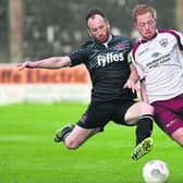 Galway United's Ryan Connolly in a race for possession with Dundalk FC's Stephen O'Donnell during Tuesday's Premier Division tie at Eamonn Deacy Park. Photos: Joe O'Shaughnessy.