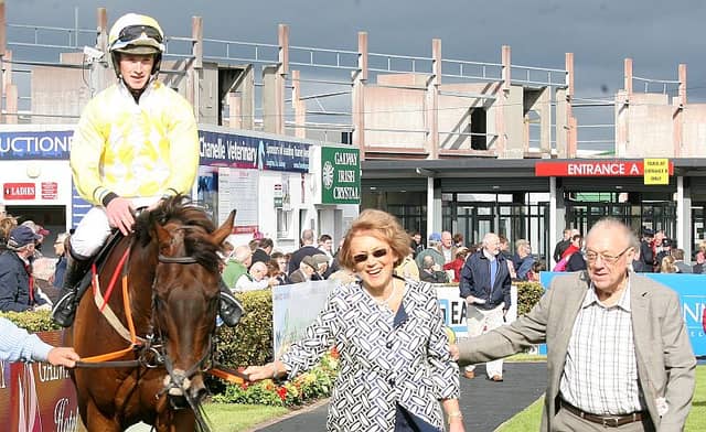 Beckwith Star, ridden by Adam O'Neill, is led in by Emily and Herb Stanley from Loughrea, after winning the Easyfix Rubber Products Handicap Hurdle on the opening evening at the Galway Races at Ballybrit. Photos: Iain McDonald.
