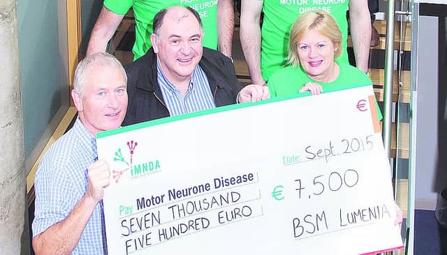Irish Motor Neurone Disease Association receives a donation of €7,500 as the Galway-based BSM Group’s Charity of the Year. Pictured with staff at the presentation were (front – from left) Sean Jackson, Group MD, BSM, Tom Reynolds, MD, BSM and Marie Reavey, Regional Development Officer, IMNDA. Photo: Andrew Downes