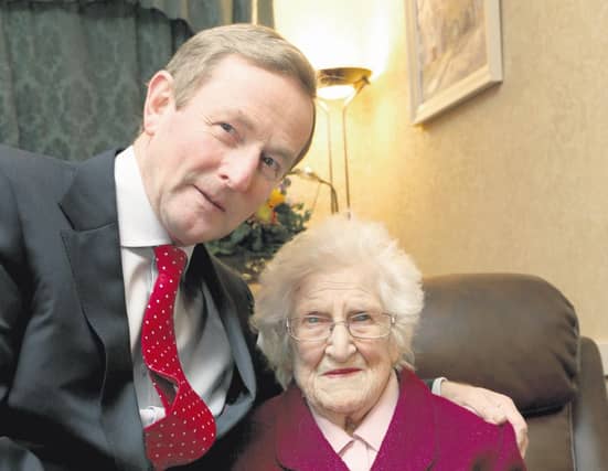 The late Julia (Juye) Freeney with Taoiseach Enda Kenny when he dropped in to Freeney's Bar in High Street to wish her the best on her 100th birthday in November 2013.