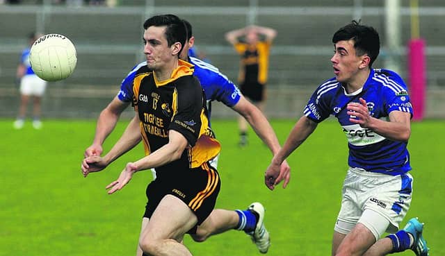 Killanin's Stuart Heffernan gives chase to Leitir Moir's Aonghus O Fatharta during Sunday's senior football encounter at Pearse Stadium. Photos: Enda Noone.