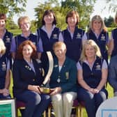President of the Irish Ladies Golf Union, Valerie Hassett, presenting Marian Cunningham, Lady Captain of Bearna Golf Club, with the AIG Junior Foursomes trophy. Also in the picture are, back row, from left: team members Bridie McNamara, Tara Cunningham, Valerie Kiely, Mary Farrell, Barbara O'Keeffe, Caroline Codyre and Claire Cunningham (Team Vice Captain). Front: Elva Leavy, Lady Captain, Knightsbrook GC; Catherine Quinlan, team manager; Ailis McDermott; and Declan O'Rourke, general manager, AIG Ireland. Photo: Pat Cashman.
