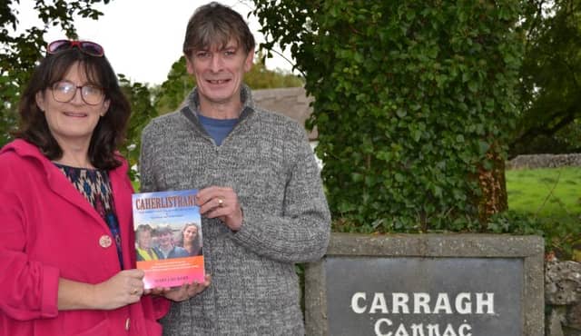 Singer Sean Keane congratulates author Mary J Murphy on her publication simply entitled Caherlistrane. Sean and the Keane family feature prominently in the publication.