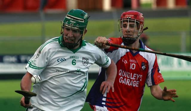 Moycullen's Mark Lydon is chased by Ahascragh-Fohenagh's Eoghain Delaney during the Intermediate hurling championship semi-final at Kenny Park on Saturday. Photo: Enda Noone.