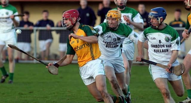 Craughwell's Stephen Hynes is chased by Sarsfields Ian Skehill and Ronan Quinn during Sunday's Galway senior hurling final at Kenny Park. Photo: Enda Noone.