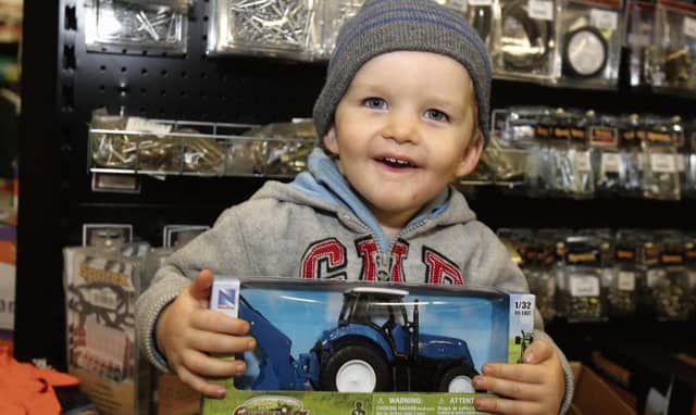 Adam Stoddard from Portumna happy with his new blue tractor at the Portumna Agri. Open Day. PHOTO: HANY MARZOUK.