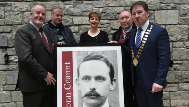 Galway County Council Cathaoirleach Cllr Peter Roche making a presentation of a Framed Image of Eamonn Ceannt to the community of Ballymoe represented by Martin Griffin, Martin McHugh and Michael Ward with Mary Gallagher (grandniece of Éamonn Ceannt) at a ceremony in County Hall to mark the start of the centenary of 1916.
