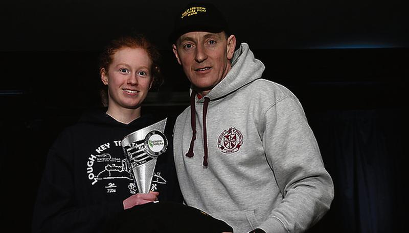 Caron Ryan of Craughwell AC, who won the ladies section of the Kilconieron 5 mile, pictured with race organiser, Patrick Forde.