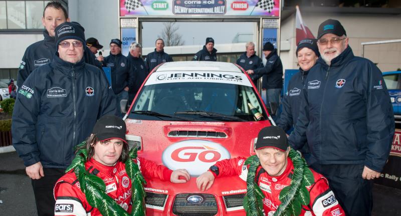 Winners of the Galway International Rally 2016, Gary Jennings and Rory Kennedy pictured with members of the Galway Motor Club at the finish line in the Clayton Hotel on Sunday evening.  Photo: Reg Gordon