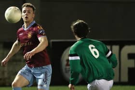 Galway United’s Cormac Raftery gets to the ball ahead of the Mayo League’s JP O’Gorman during Monday night’s EA Sports Cup tie at Eamonn Deacy Park. Photo: Joe O’Shaughnessy.